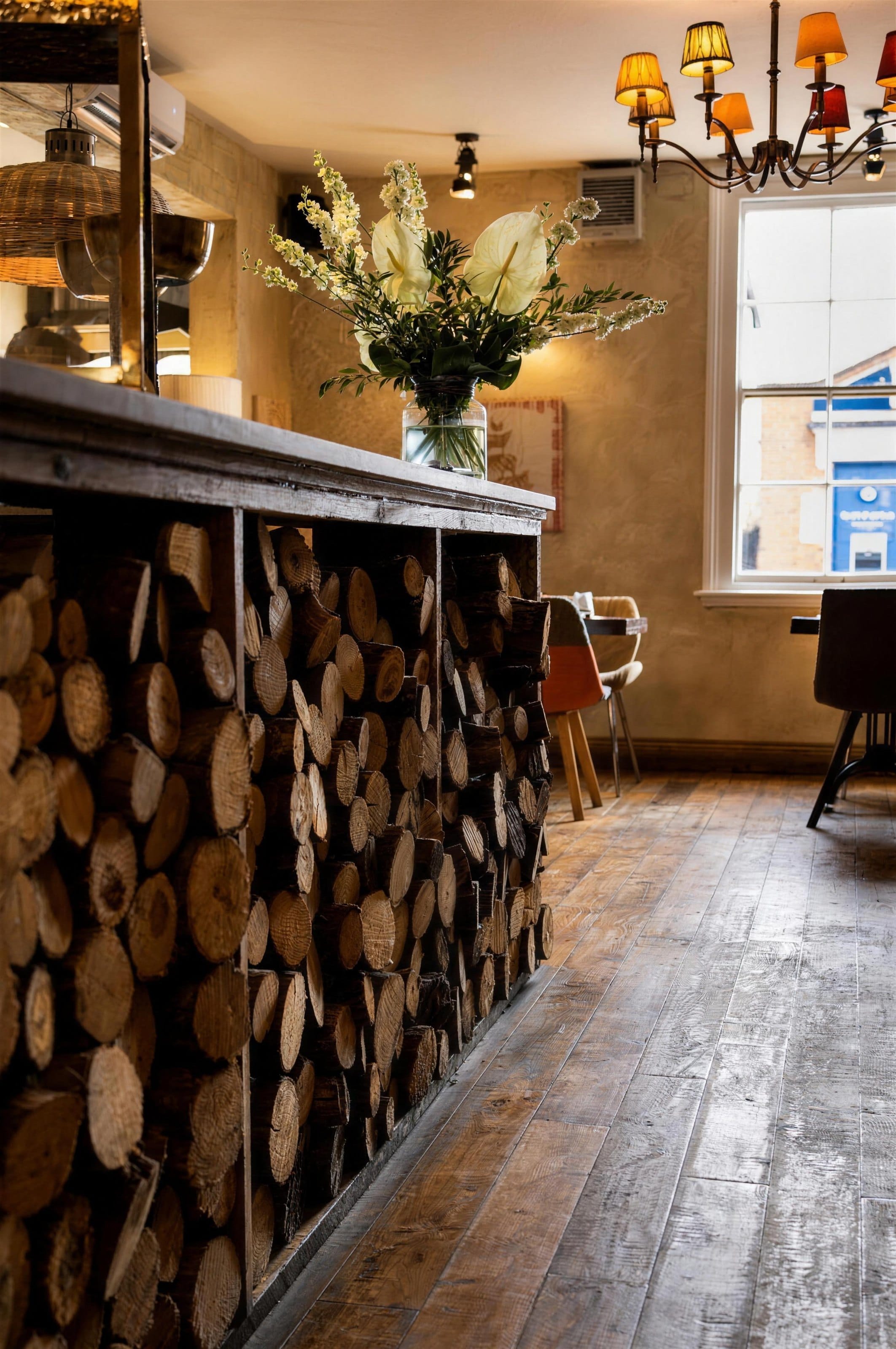 A bar with a log wall